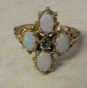 9ct gold opal and emerald ring size O/P total weight 4.5 g H 19 mm (opal size 6 mm x 4 mm)