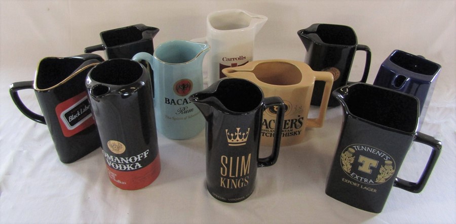 Selection of ceramic advertising jugs inc Black Label, Bacardi rum and Tennent's Extra