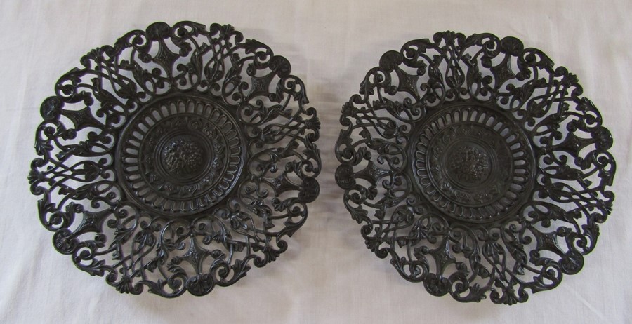 Pair of pierced Coalbrookdale foliate motif plates, both stamped Coalbrookdale and the number 207 to