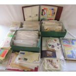 Large quantity of FDCs and postcards together with loose unused stamps etc
