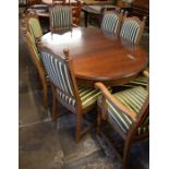 Modern mahogany draw leaf dining table and 8 chairs extending to 170cm by 120cm