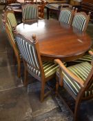 Modern mahogany draw leaf dining table and 8 chairs extending to 170cm by 120cm