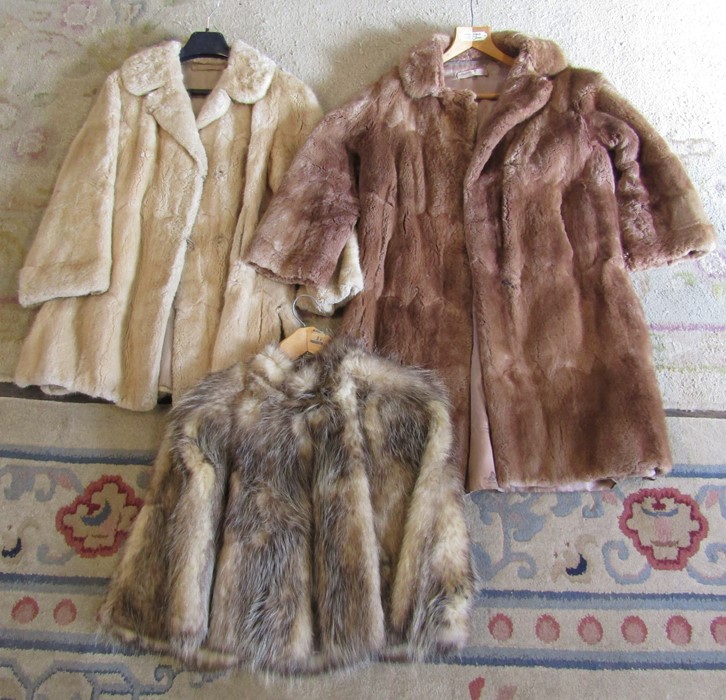 2 fur coats and a fur cape / shrug