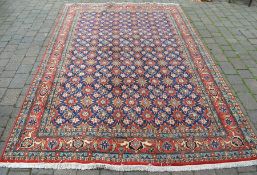 Red ground Persian rug 300 cm x 199 cm