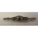 9ct gold brooch with central amethyst stone and seed pearls L 5 cm weight 2.1 g