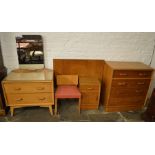E Gomme early G-Plan oak bedroom suite comprising chest of drawers, dressing table/chest of drawers,
