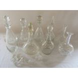 Various glass decanters and stoppers
