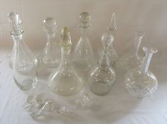 Various glass decanters and stoppers
