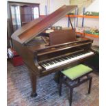 Chappell London baby grand piano with stool, sheet music and music stand