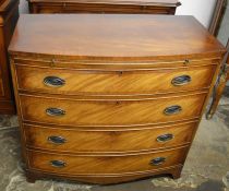 Bevan Funnell reproduction Georgian bow fronted chest of drawers with brushing slide & splayed