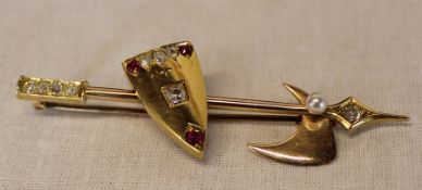 Tested as 14ct gold arrow brooch set with diamonds (approx. 0.40ct) & rubies (approx. 0.16ct), and