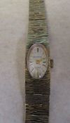 9ct gold ladies Everite 17 jewels watch with 9ct gold strap total weight 18.5 g