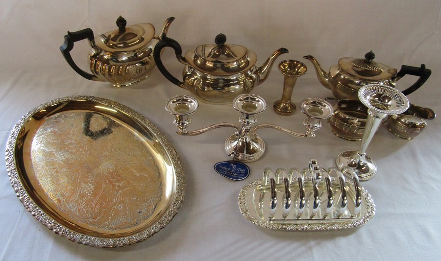 Selection of silver plate inc tea service, toast rack and candelabra