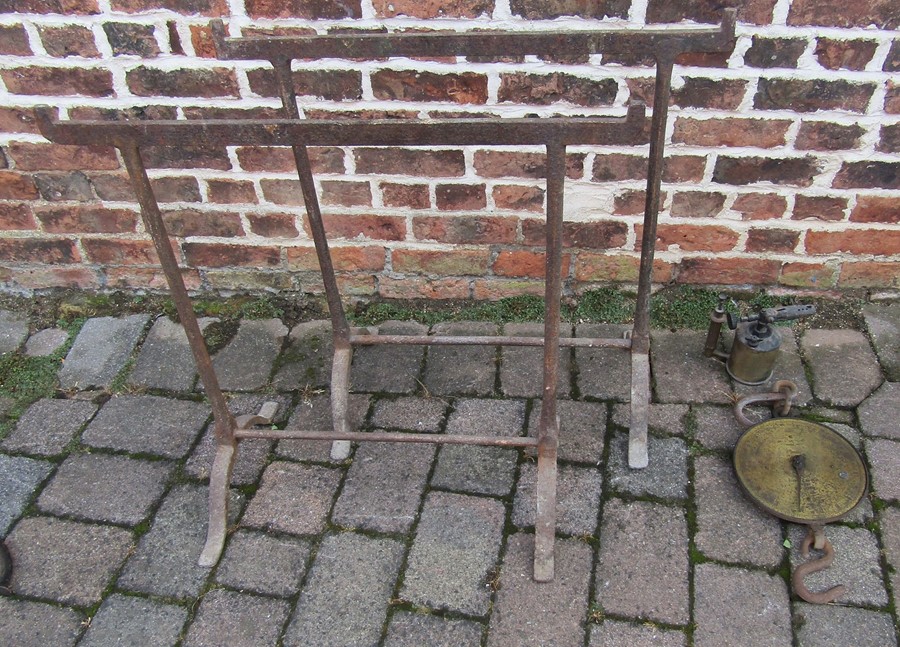 Pair of Victorian wrought iron trestle stands, blow torch & weighing scales