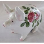 Wemyss ware seated pig glazed in white with clover pattern L 16 cm H 10.5 cm