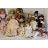 Quantity of modern bisque head dolls including Ashton Drake & some doll stands