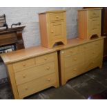 Light wood bedroom suite comprising 2 chest of drawers & a pair of bedside cabinets. Largest L 134cm