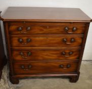 Reproduction Georgian mahogany chest of drawers with blind fretwork canted corners, swan neck