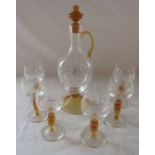 Glass decanter with yellow glass trim and stopper decorated with grapes and vines together with 6