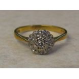 18ct gold diamond cluster ring (illusion set) size N/O weight 2.9 g