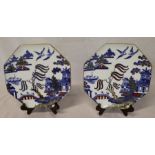 Pair of Wedgwood octagonal Willow pattern plates with gilt detail, impressed Portland mark, dia.