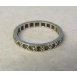 Tested as 9ct gold full eternity ring with spinel stones size N weight 2.1 g