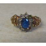 9ct gold cluster dress ring with blue and white coloured stones size P weight 3.2 g