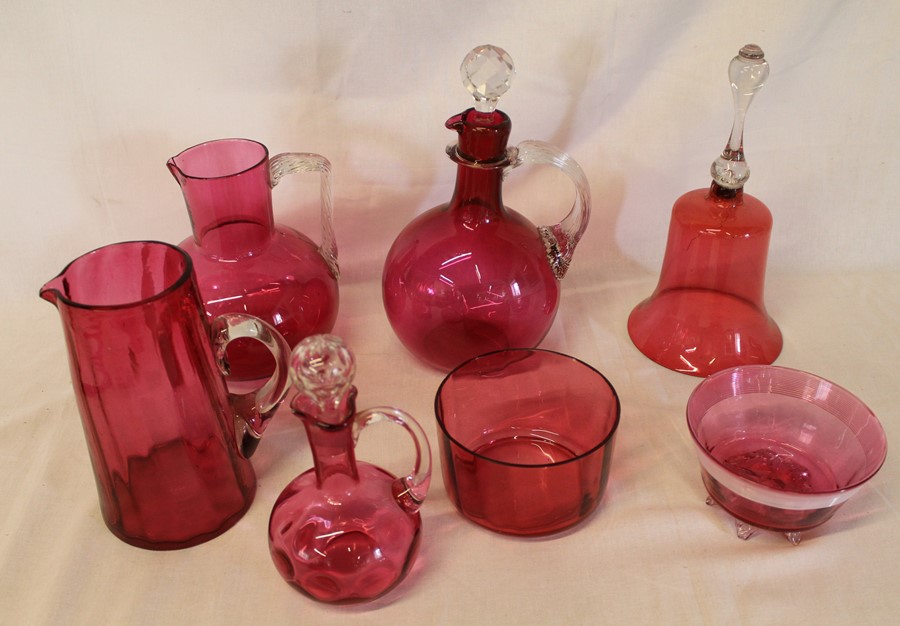 Cranberry glass decanters, jugs, bowls & bell