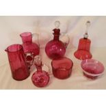 Cranberry glass decanters, jugs, bowls & bell