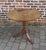 Tilt top pedestal table