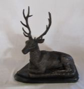 Bronze figure of a recumbent stag L 38.5 cm H 39 cm (crack to base)