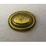 Tested as 14 ct gold mourning brooch with central diamond 0.10 ct  total weight 11 g