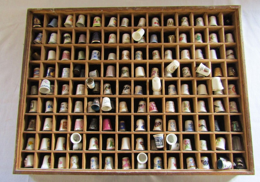 Large collection of thimbles in wooden case 49 cm x 36.5 cm