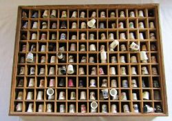 Large collection of thimbles in wooden case 49 cm x 36.5 cm