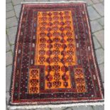 Burnt orange Afghan Baluchi nomadic rug approx 126cm by 81cm