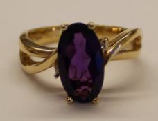 14k single stone amethyst ring (3ct) with diamond accents, size T, weight approximately 6.5g