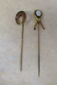 Tested as 1 9ct gold stock pin (horseshoe) and 1 yellow metal stock pin