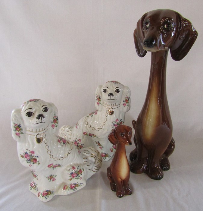 Pair of Staffordshire style spaniels H 30 cm & 2 Jema Holland long necked Dachshund figures number