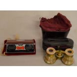 Mother of pearl opera glasses with concertina case & a pair of compact opera glasses