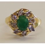 Tested as 14ct gold (marked 14k) emerald and iolite ring, size P 1/2, weight approximately 4.62g