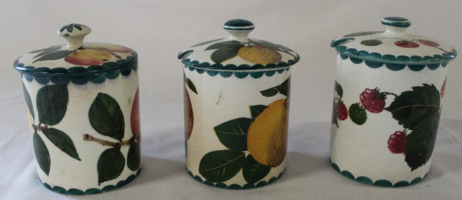 3 Wemyss pottery lidded preserve pots with orange (possible restoration to lid), raspberry & apple