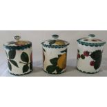 3 Wemyss pottery lidded preserve pots with orange (possible restoration to lid), raspberry & apple