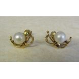 Pair of 14ct gold pearl earrings, total weight 4.2 g