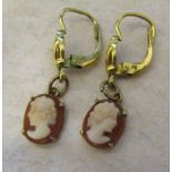 Pair of 9ct gold cameo drop earrings with yellow metal fasteners