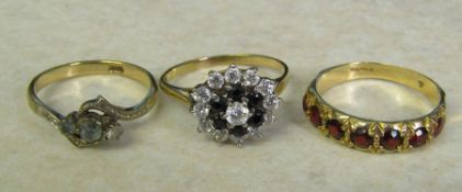 3 9ct gold dress rings with coloured stones size O, P and N total weight 6.5 g