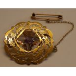 Ward Brothers 9ct gold Scottish thistle brooch with pierced decoration, central amethyst & safety