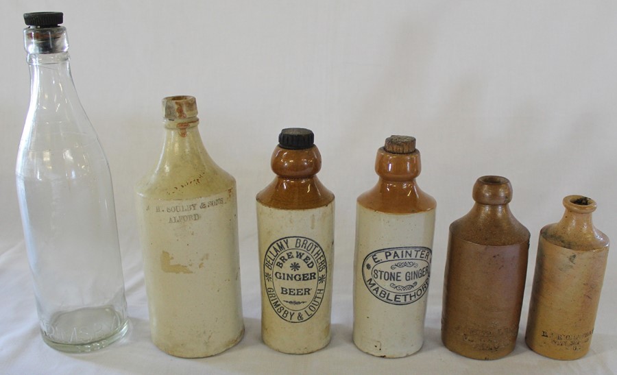 Selection of local bottles including Richardson & Low of Alford veterinary bottles, Soulby & Sons