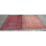 2 Persian rugs largest 178cm by 125cm
