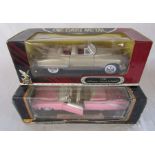 2 boxed metal die cast cars - 1949 Cadillac coupe deville 1:18 and 1959 Cadillac Eldorado biarritz