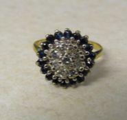 18ct gold diamond and sapphire cluster ring size L/M weight 4.2 g